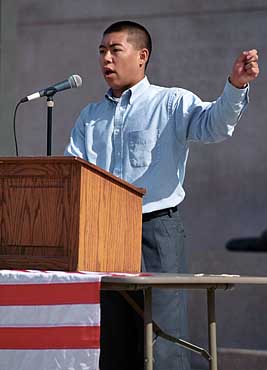 Photo of Ali Khorsand speaking during an America United rally