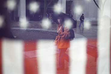 Photo of American flag in window