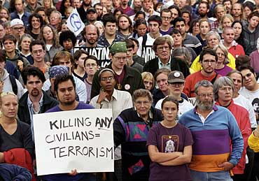 Photo of students gathered for interfaith vigil on Library Mall