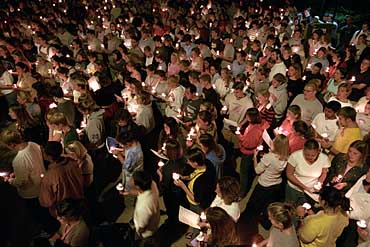 Photo of students gathered for interfaith vigil on Library Mall