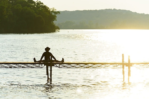 The limnology pier on Lake Mendota becomes the perfect place to stretch one’s legs and enjoy a July sunset.