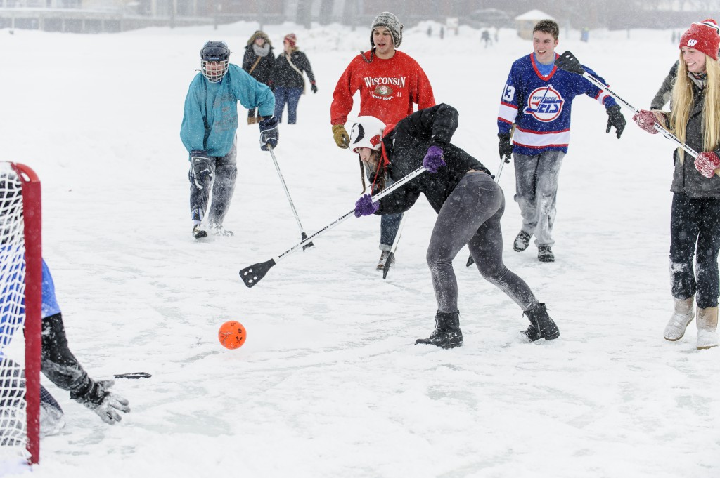 Teams of UW-Madison students compete during the Hoofer Winter Carnival Broomball Tournament on Lake Mendota.