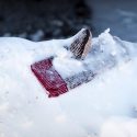 Well, this is not good: A lost mitten awaits its owner in a parking lot snow bank near UW-Madison’s Walnut Street Greenhouse during a subzero winter day on Wednesday, Jan. 7.