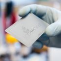 Roland Green, president of Invenra, holds a branded antibody array in the company’s research lab at the University of Wisconsin-Madison’s University Research Park.