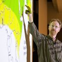 Anthony Ives, professor of zoology, gives a lecture on locust populations during a class session in 2008.