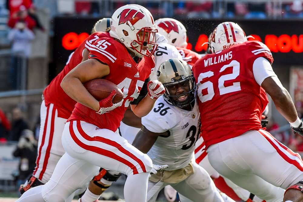 In the game, running back Alec Ingold (45) made his way into the end zone for a first-quarter touchdown — one of his two scores in Wisconsin's 24-7 win.
