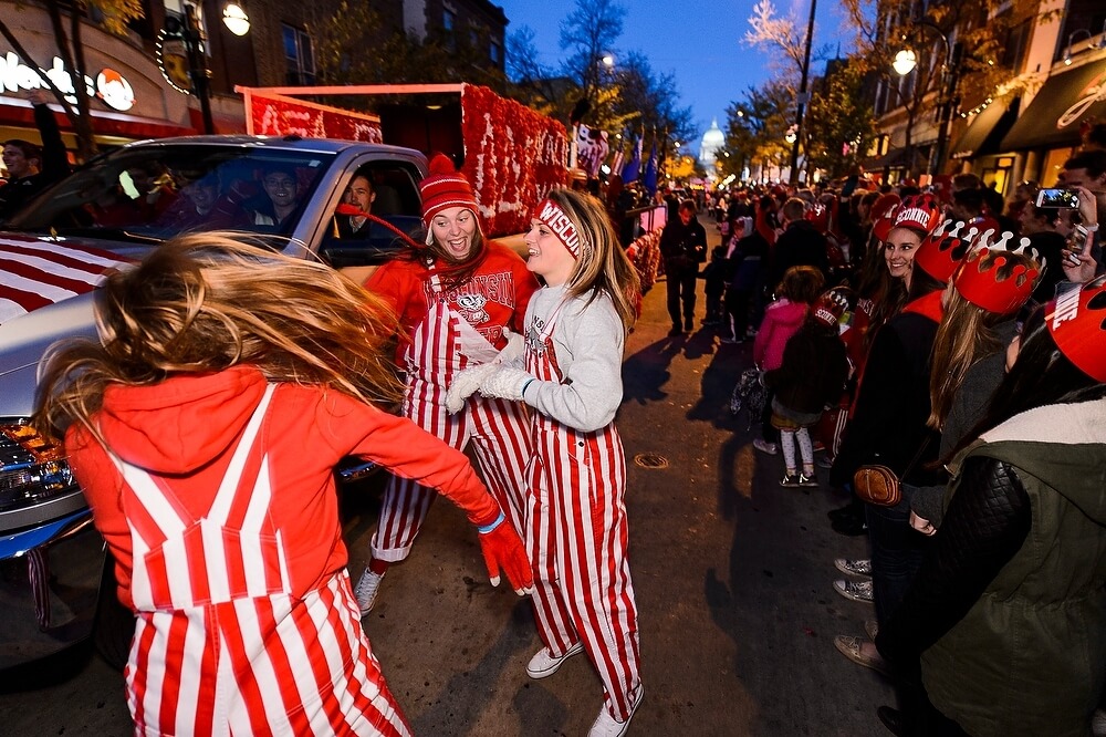 Several revelers made a fall fashion statement in the striped bib overalls that have become standard gear for many a well-dressed fan.
