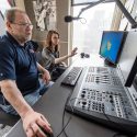 Dave Black (left), general manager at WSUM Radio, works with student creative director Maureen Duthie (right) in the news studio at WSUM Radio inside 333 Campus Mall at the University of Wisconsin-Madison on March 20, 2015. Black is the recipient of a 2015 Academic Staff Award. (Photo by Bryce Richter / UW-Madison)