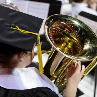 Pulling double duty, Lydia Garlie plays the euphonium with the Varsity Band before graduating with a bachelor's in math and statistics.