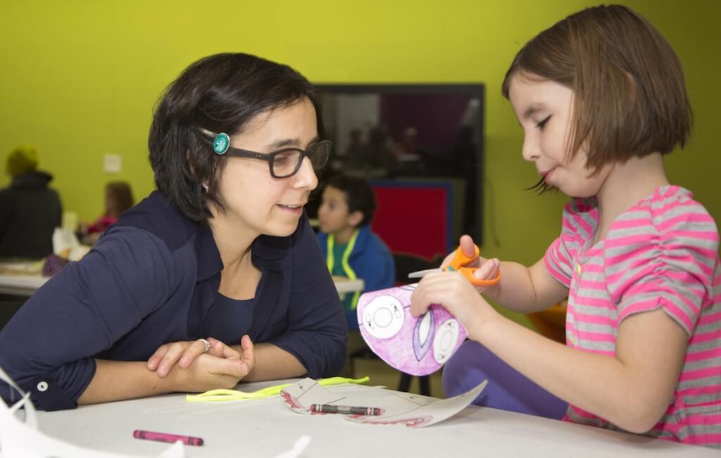 UW-Madison School of Education and WCER researcher Erica Halverson, with help from daughter Grace, explores how making affects learning. She is working with the Madison Public Library’s hands-on program called The Bubbler.