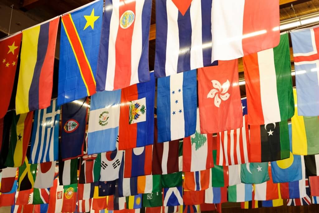 International flags representing countries around the world hang from the ceiling during a Turkish-American friendship dinner at UW–Madison's Eagle Heights Community Center in 2013.