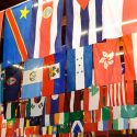 International flags representing countries around the world hang from the ceiling during a Turkish-American friendship dinner at UW-Madison's Eagle Heights Community Center in 2013.