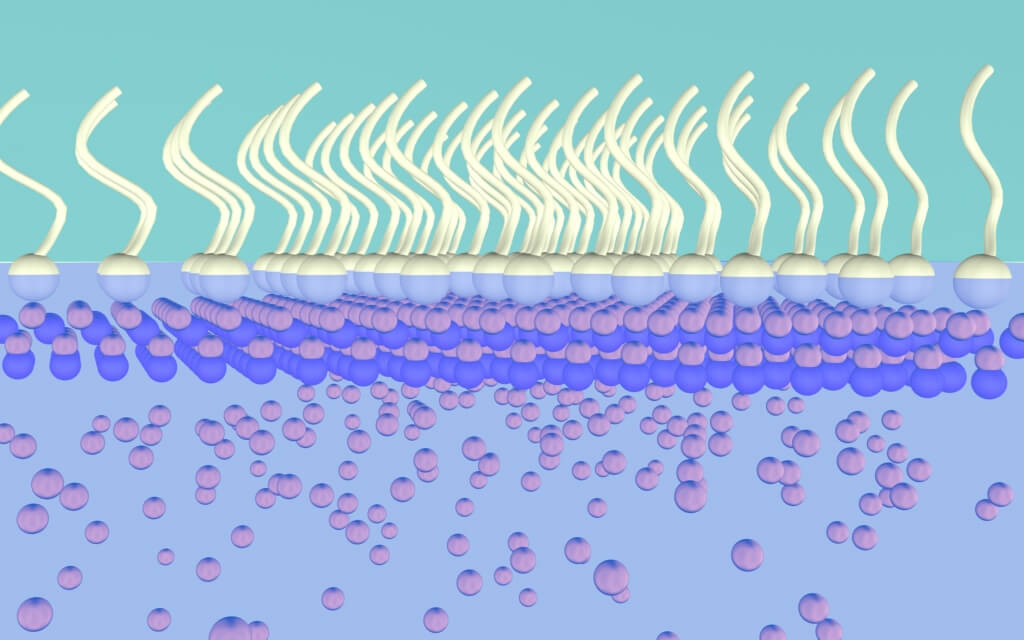 The new nanoscale manufacturing process draws zinc to the surface of a liquid, where it forms sheets just a few atoms thick. 