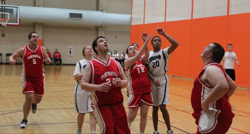 Teams battle it out under the basket in a recent Special Olympics tournament, hosted at the SERF by the student group Badgers For Special Olympics (BFSO).