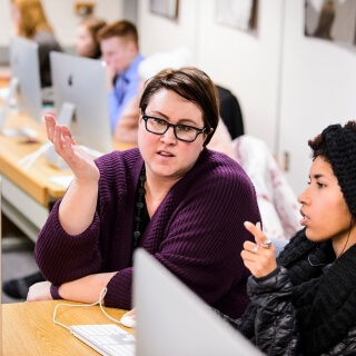 Ahna Skop, associate professor of genetics and life sciences communication, works with undergraduate student Bella Sobah, right, in a computer lab as part of a Genomics and Proteomics class that she is teaching in the Animal Sciences Building at the University of Wisconsin-Madison on Feb. 11, 2016. Skop is one of twelve 2016 Distinguished Teaching Award recipients. (Photo by Jeff Miller/UW-Madison)