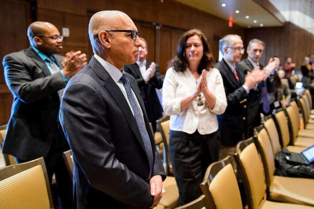 UW-Madison Vice Chancellor for Finance and Administration Darrell Bazzell stands during a special acknowledgment by Chancellor Rebecca Blank of his career contributions during a UW System Board of Regents meeting at Union South on Feb. 5,