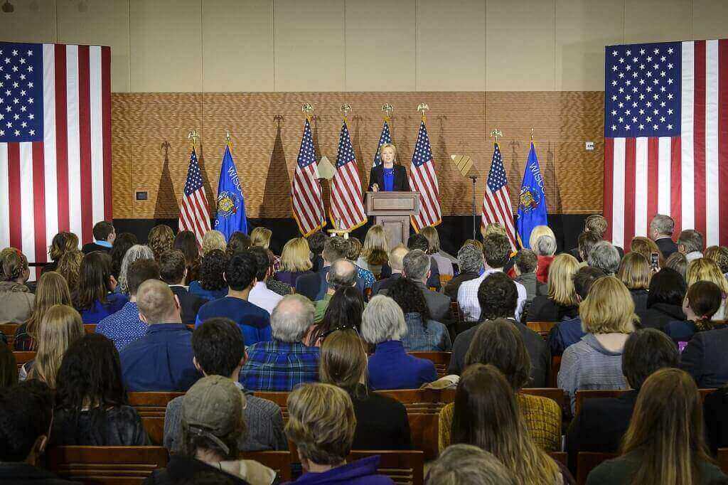 Photo: Hillary Clinton speaking to roomful of spectators