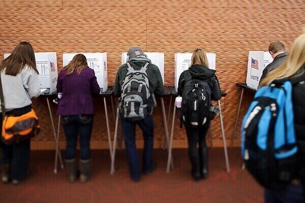 Students fill out their ballots at a polling station in the Gordon Dining and Event Center during the November 2012 election.