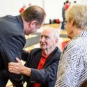 Greg Gard, left, talks with Jim and Pauline Nedelcoff after being announced the 16th head coach of the Wisconsin Badgers men's basketball team Tuesday. Gard began his career under Coach Nedelcoff at Southwestern High School in Hazel Green, Wis.