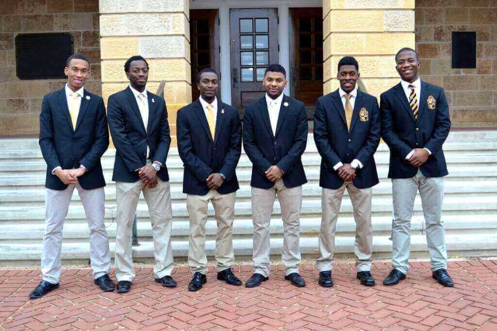 Keven Stonewall, second from left, poses with his Alpha Phi Alpha fraternity brothers.