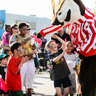 Photo: Young boys are excited to meet UW-Madison mascot Bucky Badger.