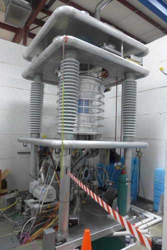 Big white machine with curved layers and coil-like supports