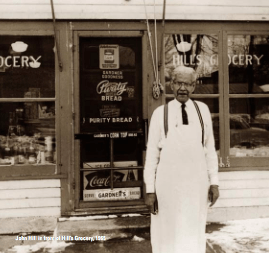 Photo: John Hill in front of store