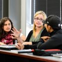 Photo: Aleks Talsky, seated at center and an undergraduate from UW-Milwaukee, makes a point as students discuss election law in a class taught by Steven Wright, a clinical instructor with the Wisconsin Innocence Project, during a closing session of the inaugural James E. Jones Jr. Pre-Law Scholars Program at the Law Building at UW-Madison on June 29.