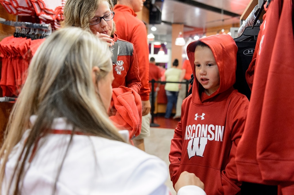 Photo: Boy trying on sweatshirt