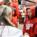 Photo: Boy trying on sweatshirt