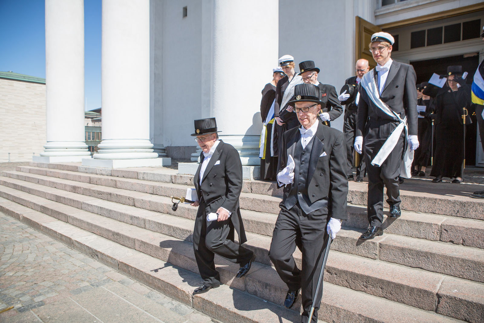 Sociology Professor Douglas Maynard, center, leaves the Great Hall at the University of Helsinki after receiving an honorary doctorate. (Photo: Mikka Verto)