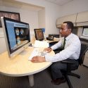 Dr. Ozioma Okonkwo of the Wisconsin Alzheimer’s Disease Research Center studies ways to protect the brain from the effects of Alzheimer’s Disease. (Photo by Clint Thayer)