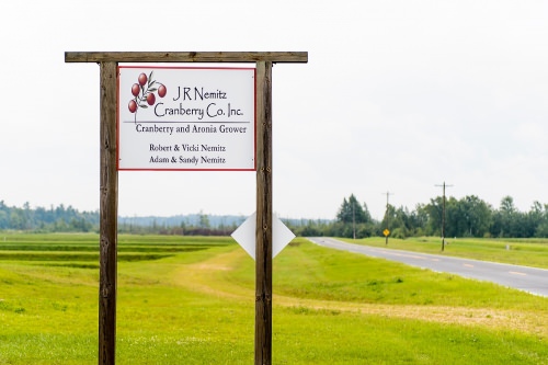 A sign marks the entrance to the Nemitz family farm near Tomah, Wisconsin on Aug. 11, 2016. (Photo by Bryce Richter / UW–Madison)