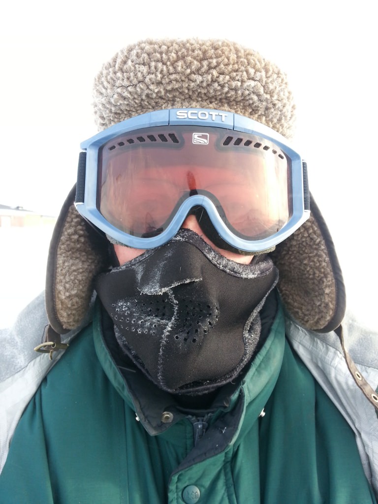 Jack Williams is bundled up to protect against extreme cold and wind during a winter season in the field on polar St. Paul Island. 