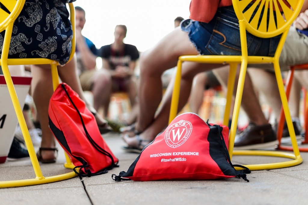 Incoming first-year undergraduates talk about the challenges new students may face as they transition to campus life as a new-student leader facilitates a small-group discussion during in a Student Orientation, Advising and Registration (SOAR) session outdoors at Union South's The Plaza at the University of Wisconsin-Madison on June 20, 2016. Sponsored by the Center for the First-Year Experience, the two-day SOAR sessions provide new students and their parents and guests an opportunity to meet with staff and advisors, register for classes, stay in a residence hall, take a campus tour and learn about campus resources. (Photo by Jeff Miller/UW-Madison)