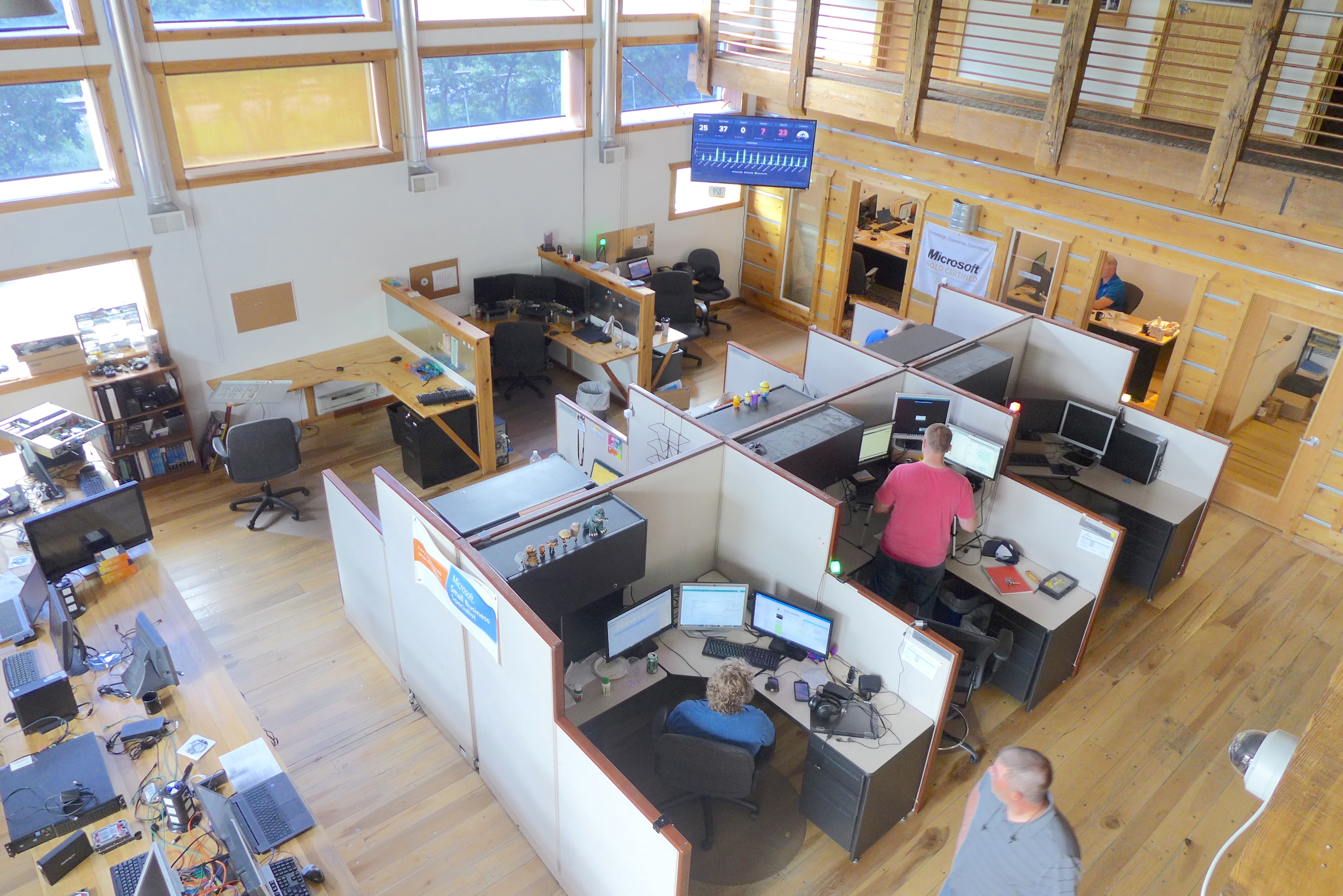 Applied Tech in Madison provides network and computer services to businesses and organizations across Wisconsin. The blue screen at center shows the status of customer support calls. 