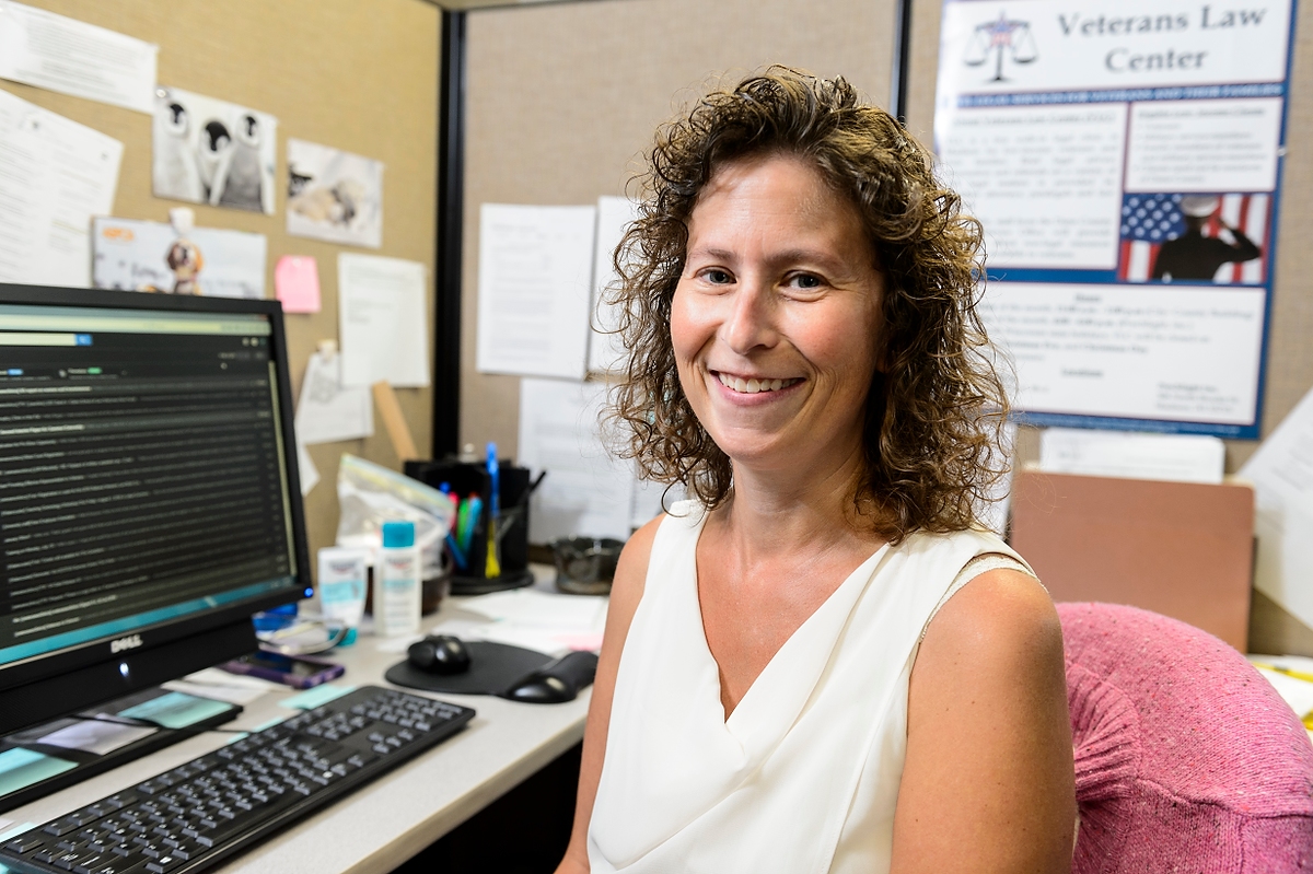 Laura Smythe, director of UW Law School's Pro Bono program, is pictured in her Law Building office at the University of Wisconsin–Madison. Included within the Pro Bono program is the Veterans Law Center, which provides civil legal services for veterans and their families, both in the Madison area and beyond via a mobile outreach clinic.