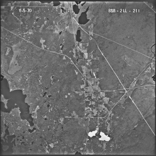 The scar from the Nov. 18, 1966, crash of an Ari Force B-52 bomber is still visible — near the horizontal centerline of the image, directly down from the “2LL” mark in the upper right — in this aerial photo taken in June of 1970. 