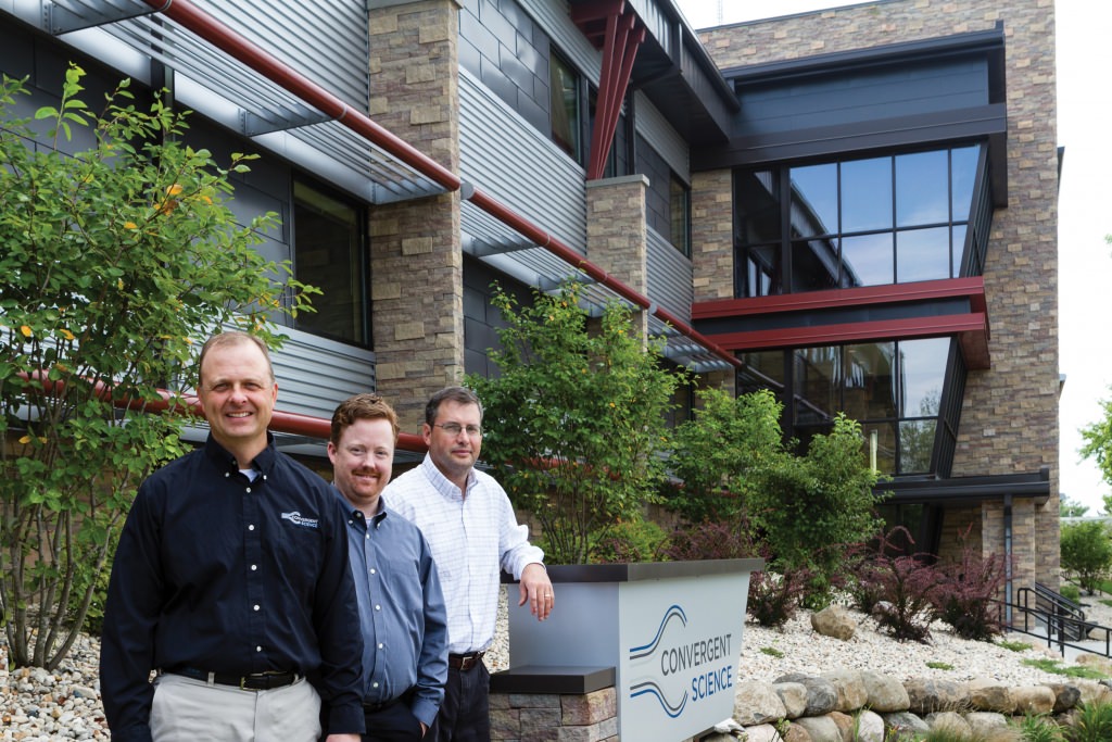 Three of the co-founders of Convergent Science, a UW–Madison spinoff that makes advanced engine-design software, at the company’s Madison headquarters. From left: Eric Pomraning, Kelly Senecal and Keith Richards. 