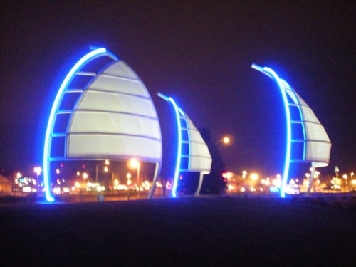 Photo: Neon sculpture of sails at the entrance to Monona