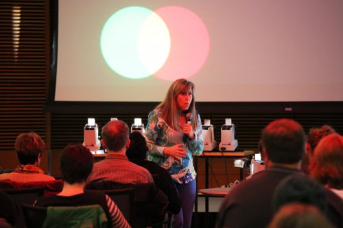 Photo: Pupa Gilbert, a professor of physics at UW–Madison, presents the physics of color at the Nerd Nite event during the 2015 Wisconsin Science Festival. At the 2016 festival, Nerd Nite is a partner in the “Science Storytellers Jam!” that aims to engage audiences in science through creative storytelling.