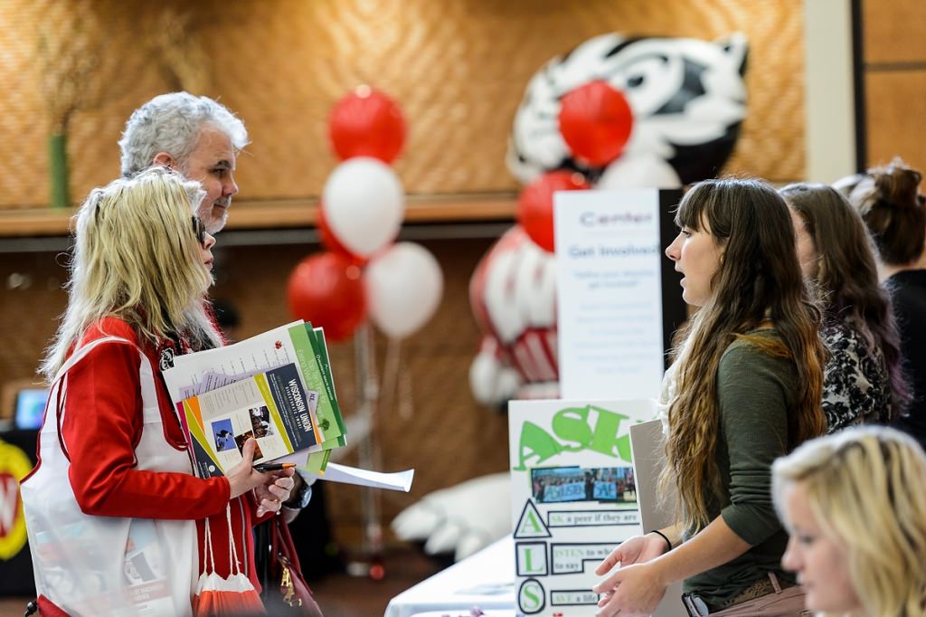 Badger parents take part in a Family Weekend resource fair Friday at the Gordon Dining and Event Center. Hosted by the UW-Madison Parent Program, the three-day event provides families of current students with a range of activities to experience and explore the campus.