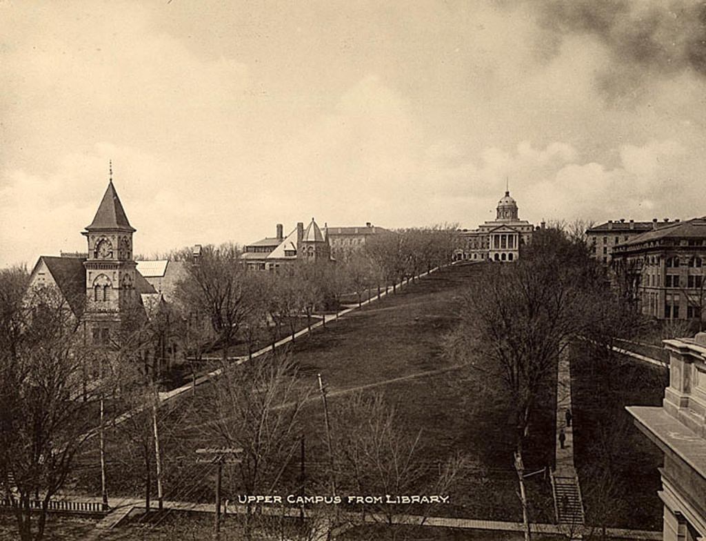 A view up Bascom Hill, taken not long before the dome burned in 1916. The photo is taken from what is currently the Wisconsin Historical Society building. That building originally housed both the State Historical Library and the University Library, until Memorial Library was built in 1950.