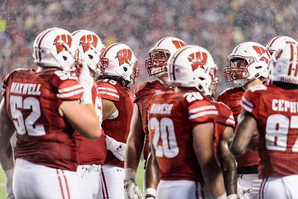 Rain starts to fall in the second half.