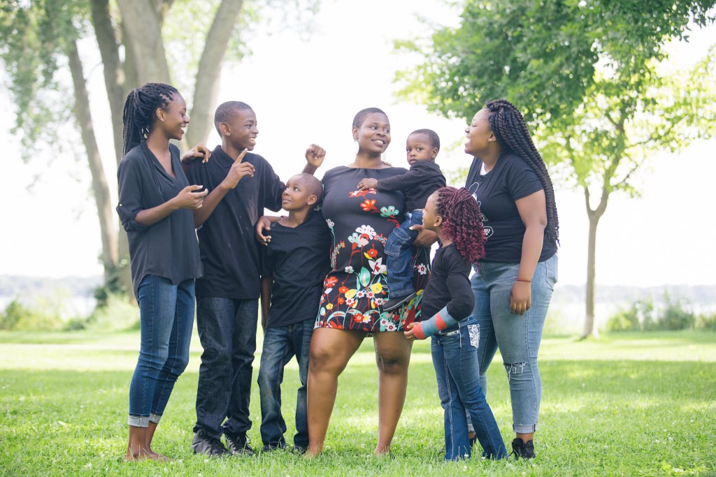 Sagashus Levingston, center, is working toward a Ph.D. in English literature, even while raising her six children. 