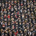 Photo: Students in caps and gowns