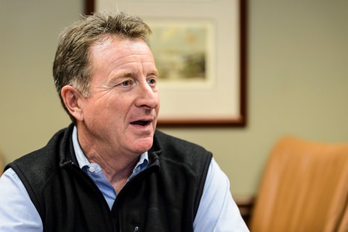 John Baumann, President and CEO of Colony Brands, Inc., talks with a reporter at his company's headquarters in Monroe, Wis.