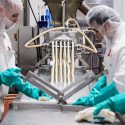 Staff at Chula Vista Cheese Company cut and package a batch of Oaxaca-style string cheese at their food-processing facility in Browntown, Wis., on Dec. 27, 2016. Chula Vista Cheese created the successful, Oaxaca-style of string cheese with the consulting and test-batch help of the Center for Dairy Research at the University of Wisconsin-Madison. (Photo by Jeff Miller/UW-Madison)