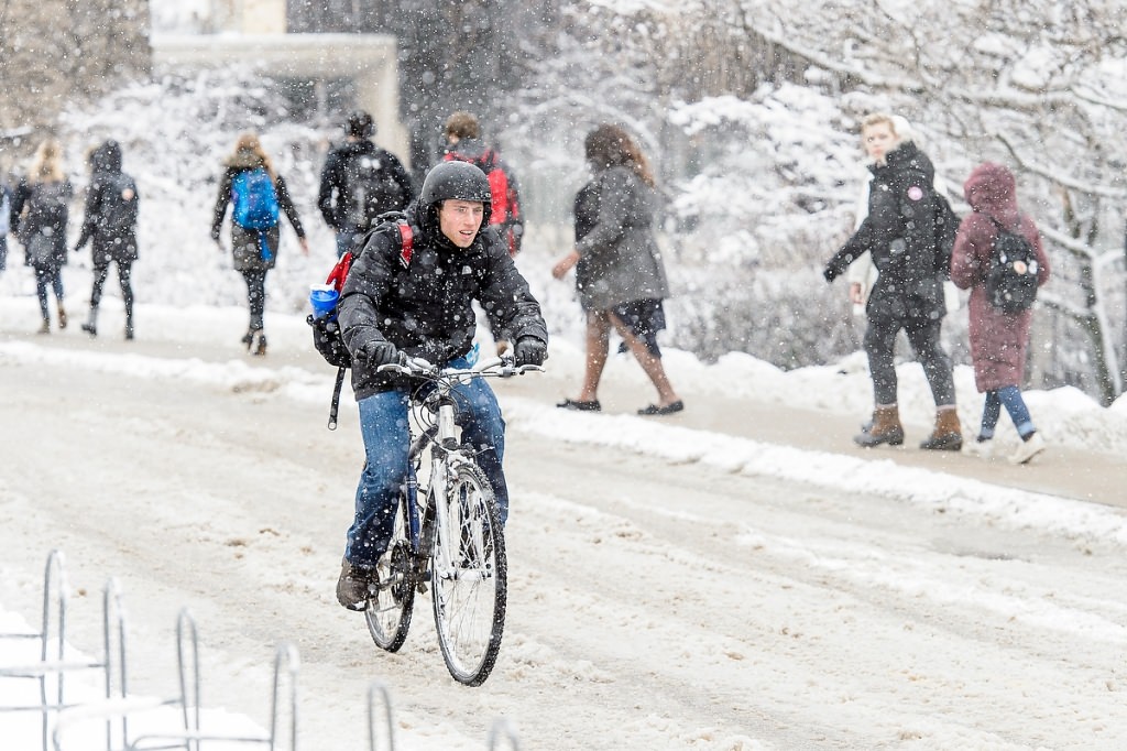 Some persisted in riding bicycles despite the slippery conditions.