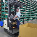 Workers on lift trucks pick parts from more than one-half million stocked items at the Endries warehouse in Brillion, Wisconsin. Endries International, of Brillion, Wisconsin, has announced an electronic system to ensure that the parts bins it maintains at customer’s factories hold optimal inventory to meet customer's changing needs. The system was developed in conjunction with the University of Wisconsin Electronic Business Consortium.  
Photo by David Tenenbaum/University Communications